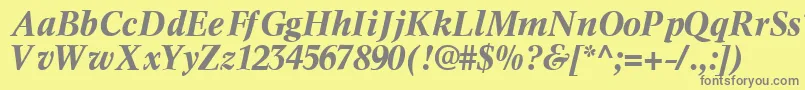 InformaticssskBoldItalic-fontti – harmaat kirjasimet keltaisella taustalla