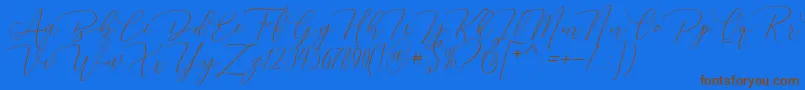 Dhenmark-Schriftart – Braune Schriften auf blauem Hintergrund