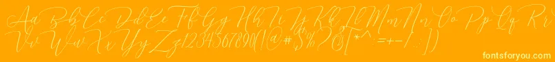 Dhenmark-Schriftart – Gelbe Schriften auf orangefarbenem Hintergrund