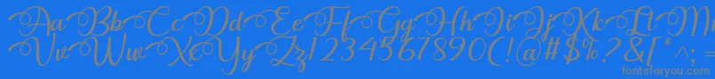 Fonte Dhitha Font by 7NTypes – fontes cinzas em um fundo azul