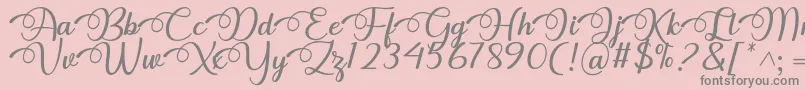 Fonte Dhitha Font by 7NTypes – fontes cinzas em um fundo rosa