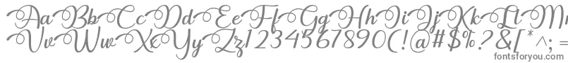 Czcionka Dhitha Font by 7NTypes – szare czcionki