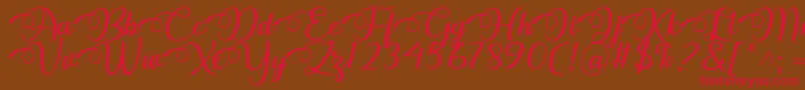 Czcionka Dhitha Font by 7NTypes – czerwone czcionki na brązowym tle