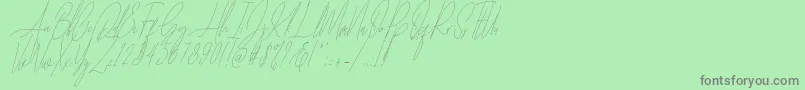 Czcionka Diamante Signature Italic   – szare czcionki na zielonym tle