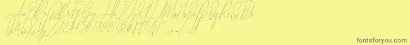 Diamante Signature Italic  -Schriftart – Graue Schriften auf gelbem Hintergrund