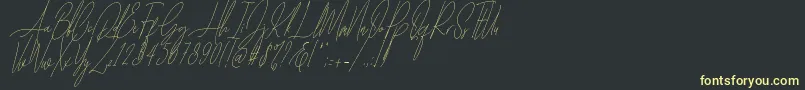 Czcionka Diamante Signature Italic   – żółte czcionki na czarnym tle
