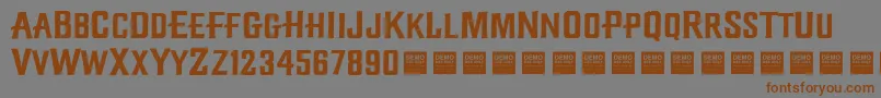 Шрифт Diamond Creek   Demo – коричневые шрифты на сером фоне
