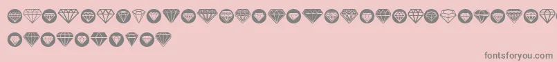 Diamondo-fontti – harmaat kirjasimet vaaleanpunaisella taustalla