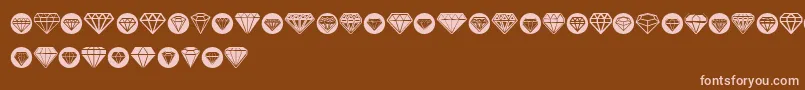 Diamondo-fontti – vaaleanpunaiset fontit ruskealla taustalla