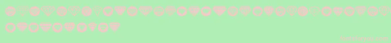 Diamondo-fontti – vaaleanpunaiset fontit vihreällä taustalla