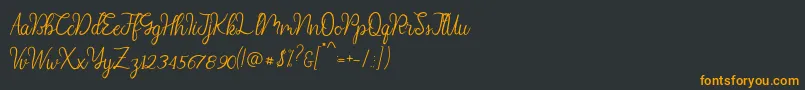 Fonte Diana Script demo – fontes laranjas em um fundo preto
