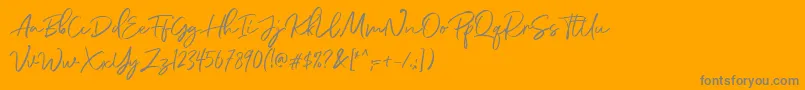 DianaWebber Script DEMO-Schriftart – Graue Schriften auf orangefarbenem Hintergrund