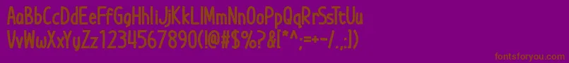 Die Grinsekatze Font – Brown Fonts on Purple Background