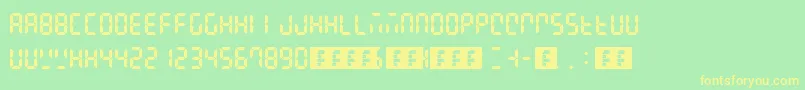 フォントDigital Display – 黄色の文字が緑の背景にあります