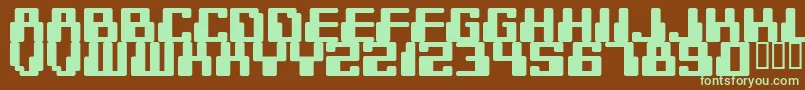 DIGITEK-fontti – vihreät fontit ruskealla taustalla