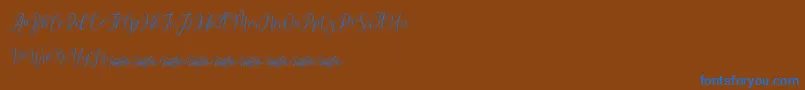 Czcionka dimmya demo – niebieskie czcionki na brązowym tle