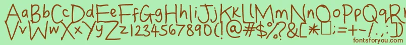 Dina s Handwriting Font – Brown Fonts on Green Background