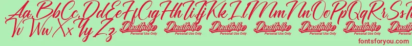 Dinattallie Personal Use Only-fontti – punaiset fontit vihreällä taustalla