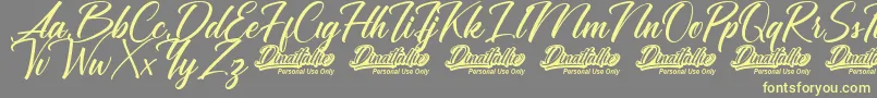 Dinattallie Personal Use Only Font – Yellow Fonts on Gray Background