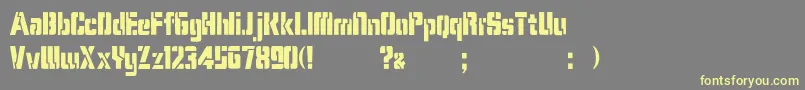 KarenStencilDker Font – Yellow Fonts on Gray Background
