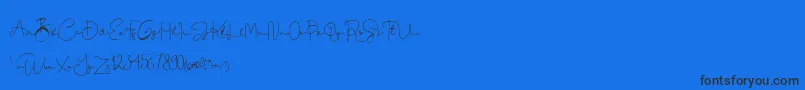 Dinda-Schriftart – Schwarze Schriften auf blauem Hintergrund