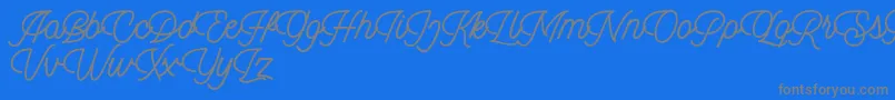 Dingbod script FREE-fontti – harmaat kirjasimet sinisellä taustalla
