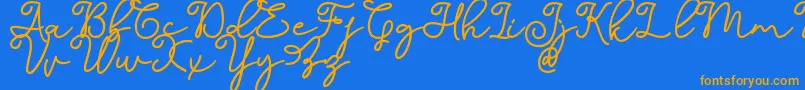 Dinila Script DAFONT Font – Orange Fonts on Blue Background