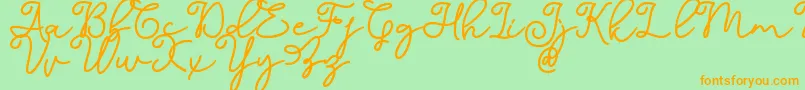 Dinila Script DAFONT-Schriftart – Orangefarbene Schriften auf grünem Hintergrund