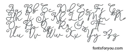 Dinila Script DAFONT Font