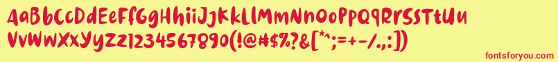 Dinomiko Font by 7NTypes-Schriftart – Rote Schriften auf gelbem Hintergrund