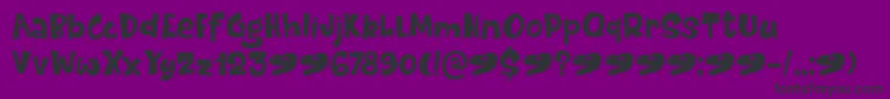 フォントDinosaur Cake DEMO – 紫の背景に黒い文字