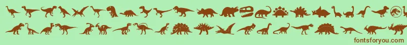 Шрифт Dinosaur Icons – коричневые шрифты на зелёном фоне