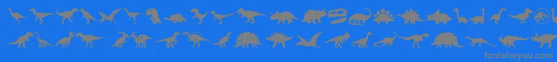 Dinosaur Icons-fontti – harmaat kirjasimet sinisellä taustalla