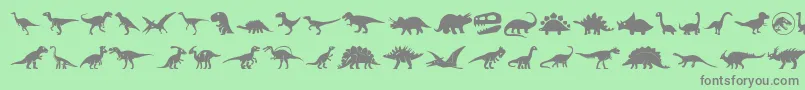 フォントDinosaur Icons – 緑の背景に灰色の文字