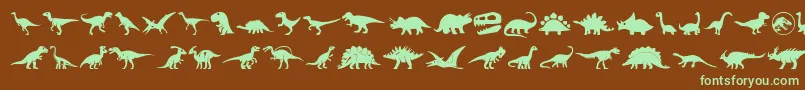 Dinosaur Icons-Schriftart – Grüne Schriften auf braunem Hintergrund