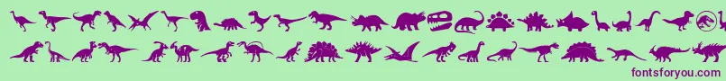 Dinosaur Icons-fontti – violetit fontit vihreällä taustalla