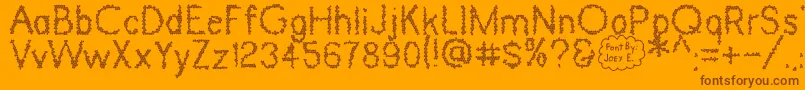 Dinosaur Skin Font – Brown Fonts on Orange Background