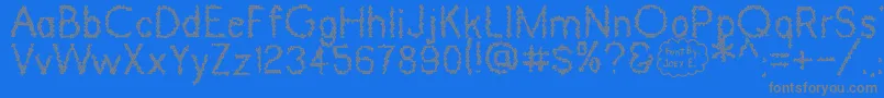 Dinosaur Skin Font – Gray Fonts on Blue Background