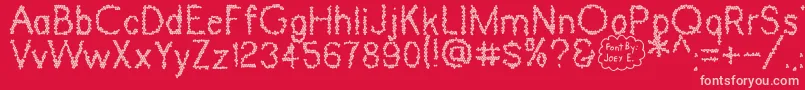 Dinosaur Skin Font – Pink Fonts on Red Background