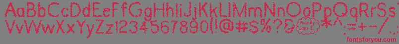 Dinosaur Skin Font – Red Fonts on Gray Background