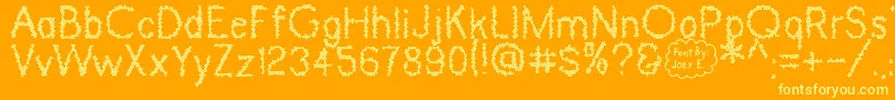 Dinosaur Skin Font – Yellow Fonts on Orange Background