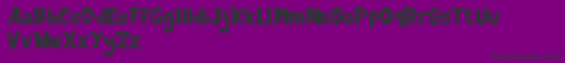 Fonte DINOTOONS DEMO – fontes pretas em um fundo violeta