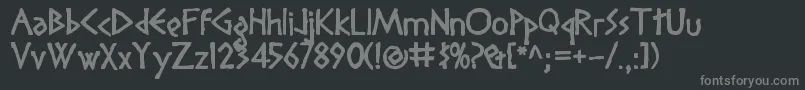 フォントDIOGENES – 黒い背景に灰色の文字