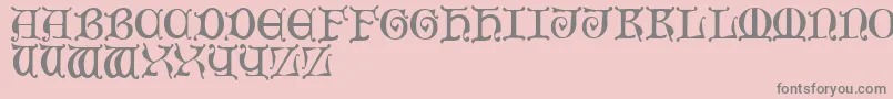MediaevalCaps Font – Gray Fonts on Pink Background
