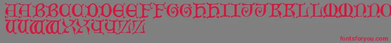MediaevalCaps-Schriftart – Rote Schriften auf grauem Hintergrund