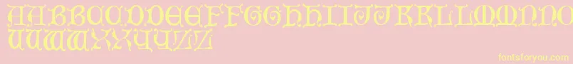 MediaevalCaps Font – Yellow Fonts on Pink Background