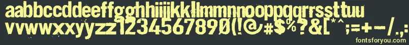 Dirt2 Stickler Font – Yellow Fonts on Black Background