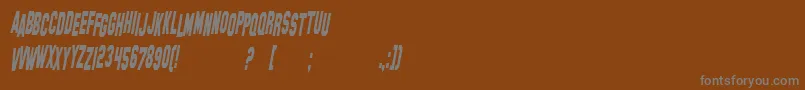 Czcionka SfHollywoodHillsCondensedItalic – szare czcionki na brązowym tle