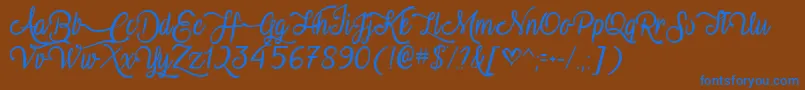 VampireCalligraphyTtf Font – Blue Fonts on Brown Background