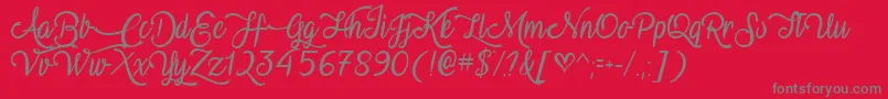 VampireCalligraphyTtf-Schriftart – Graue Schriften auf rotem Hintergrund